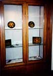 A cabinet with lacquer miniature displays
